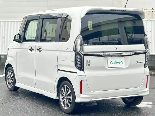 ホンダ Ｎ ＢＯＸ カスタム EX 群馬県 2022(令4)年 2.4万km プラチナホワイトパール 社外ナビ/フルセグテレビ/Bluetooth/ビルトインETC/追従型クルーズコントロール/レーンキープアシスト/車線逸脱防止アラート/プリクラッシュ/パーキングセンサー/電子パーキングブレーキ/前席シートヒーター/両側パワースライドドア/LEDヘッドライト/プッシュスタート/スマートキー×2/取扱説明書/保証書/記録簿