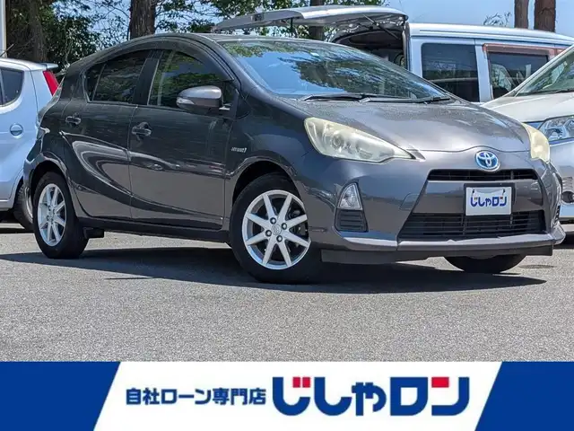 トヨタ アクア 栃木県 2012(平24)年 11.1万km グレーメタリック ”(株)IDOMが運営する【じしゃロン宇都宮店】の自社ローン対象車両になります。こちらは現金またはオートローンご利用時の価格です。自社ローンご希望の方は別途その旨お申付け下さい。/純正ナビ(CD/DVD/TV/BT)/バックカメラ/横滑り防止装置/アイドリングストップ/純正15インチAW/シートヒーター(D席＋N席)