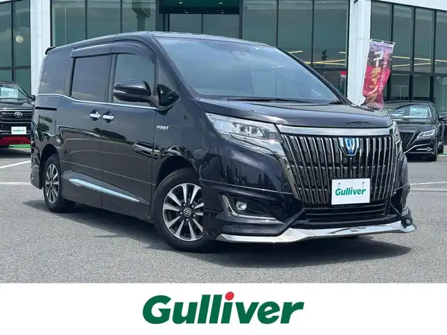 トヨタ エスクァイア ハイブリッド Gi プレミアムパッケージ 奈良県 2019(令1)年 7万km スパークリングブラックパールクリスタルシャイン モデリスタエアロ（Ｆ／Ｓ／Ｒ）　/９インチナビ　[NSZT-Y68T]/１２．１インチフリップダウン　/フルセグＴＶ　/ＥＴＣ　/専用黒革＋スウェードシート　/コンビステアリング　/トヨタセーフティセンス　/前席シートヒーター