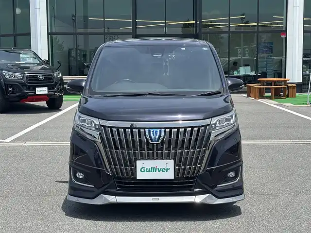 トヨタ エスクァイア ハイブリッド Gi プレミアムパッケージ 奈良県 2019(令1)年 7万km スパークリングブラックパールクリスタルシャイン モデリスタエアロ（Ｆ／Ｓ／Ｒ）　/９インチナビ　[NSZT-Y68T]/１２．１インチフリップダウン　/フルセグＴＶ　/ＥＴＣ　/専用黒革＋スウェードシート　/コンビステアリング　/トヨタセーフティセンス　/前席シートヒーター