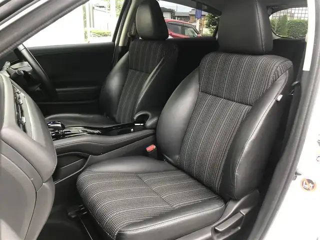 ホンダ ヴェゼル ハイブリッド Z 栃木県 2014(平26)年 9.9万km ホワイトオーキッドパール 株)IDOMが運営する【じしゃロン小山店】の自社ローン専用車両になります。こちらは現金またはオートローンご利用時の価格です。自社ローンご希望の方は別途その旨お申付け下さい//禁煙車/純正フルセグナビ/（CD/DVD/AM/FMラジオ）/(Bluetooth)/スマートキー/プッシュスタート/バックカメラ/ＥＴＣ/クルーズコントロール/シティブレーキアクティブシステム/ドライブレコーダー/パドルシフト/シートヒーター/ステアリングリモコン/電動格納ドアミラー/パワーウインドウ/自動防眩ミラー/オートライト