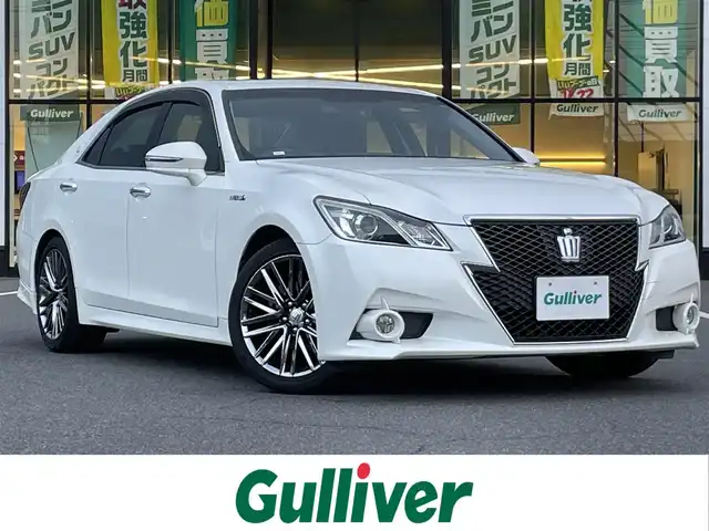 トヨタ クラウン ハイブリッド アスリートS 岡山県 2013(平25)年 8.6万km ホワイトパールクリスタルシャイン 登録時走行距離85782km/純正ナビ/フルセグTV（AM.FM.TV.CD.DVD.BT）/サンルーフ/禁煙車/ワンオーナー/前後ドライブレコーダー/バックカメラ/前席パワーシート/前席シートヒーター/クルーズコントロール/盗難防止装置/横滑り防止機能/ビルドインETC/ステアリングスイッチ/オートライト/プッシュスタート/アイドリングストップ/純正１８インチAW/純正マット/純正ドアバイザー/保証書/取扱説明書/ディーラー整備記録簿/スペアキー