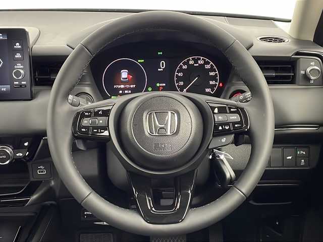 ホンダ ヴェゼル ハイブリッド e:HEV Z 愛知県 2025(令7)年 0.1千km クリスタルブラックパール /R7年10月登録済未使用車//純正HondaCONNECTナビ//フルセグTV/AMFM/Bluetooth/USB//AppleCarPlay/AndroidAuto//ビルトインETC2.0//バックカメラ//HondaSENSING//アダプティブクルーズコントロール//パーキングセンサーシステム//ブラインドスポットモニター//アダプティブドライビングビーム//後退出庫サポート//フルLEDヘッドランプ//オートライト//LEDアクティブコーナリングライト//LEDフォグランプ//フルLEDリアコンビランプ//ハンズフリーパワーテールゲート//プライムスムースコンビシート//前席シートヒーター//革巻きステアリング//ステアリングスイッチ//ステアリングヒーター//パドルシフト式減速セレクター//純正18インチアルミホイール//電子パーキングブレーキ//ブレーキホールド//ヒルディセントコントロール//プッシュスタート//電動格納ミラー//アイドリングストップ