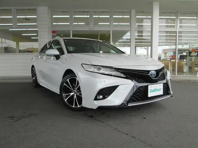 トヨタ カムリ WS 千葉県 2019(令1)年 5.1万km プラチナホワイトパールマイカ TRDフロントガーニッシュ/純正SDナビ、ワンセグTV/バックカメラ/純正オーディオ【CD/SD/BT/AUX/AM/FM】/Toyota Safety Sense/プリクラッシュセーフティ/純正オプション18アルミ/ハーフレザーシート/D席パワーシート/ステアリングスイッチ/パドルシフト/LEDヘッドライト/LEDフォグライト/オートライト/プッシュスタート/スマートキー/スペアキー/電動パーキングブレーキ/ブレーキホールド/ビルトインETC/電動格納ウィンカーミラー/社外フロアマット/新車保証書/取扱説明書/ナビ取扱説明書/整備記録簿(R5/R6)