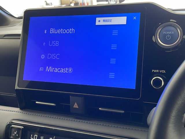 トヨタ ヴォクシー ハイブリッド S－Z 沖縄県 2022(令4)年 2.2万km グリッターブラックガラスフレーク 純正10.5型ディスプレイオーディオ/　フルセグTV/Bluetooth/バックカメラ/前後ドライブレコーダー/トヨタセーフティセンス/・レーダークルーズコントロール/・衝突軽減ブレーキ/・レーンキープアシスト/・オートマチックハイビーム/両側パワースライドドア/ETC/LEDヘッドライト/シートヒーター/アクセサリーコンセント/プッシュスタート/スマートキー/電動パーキングブレーキ/純正アルミホイール/ブラインドスポットモニター/電動格納ミラー/SOSボタン/ステアリングスイッチ/ハーフレザーシート