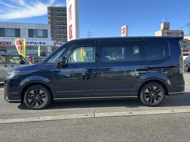ホンダ ステップワゴン スパーダ eHEV 富山県 2022(令4)年 1.8万km ミッドナイトブルービームM ワンオーナー/スマートキー２本/衝突安全ブレーキ/メーカーオプションナビ/全周囲モニター/前後ドラレコ/シーケンシャルウィンカー/フルセグTV/Bluetooth/DVD/CD再生/ビルトインETC2.0/パドルシフト/純正16インチAW/前席シートヒーター/LEDヘッドライト/フォグランプ/ACC/ハーフレザーシート/純正フロアマット/ドアバイザー/ハンドルスイッチ/革巻きハンドル/Pバックドア/BSI/横滑り防止装置/プッシュスタート/電動パーキング/２列目オットマン/衝突軽減ブレーキ