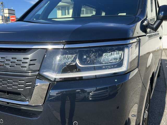 ホンダ ステップワゴン スパーダ eHEV 富山県 2022(令4)年 1.8万km ミッドナイトブルービームM ワンオーナー/スマートキー２本/衝突安全ブレーキ/メーカーオプションナビ/全周囲モニター/前後ドラレコ/シーケンシャルウィンカー/フルセグTV/Bluetooth/DVD/CD再生/ビルトインETC2.0/パドルシフト/純正16インチAW/前席シートヒーター/LEDヘッドライト/フォグランプ/ACC/ハーフレザーシート/純正フロアマット/ドアバイザー/ハンドルスイッチ/革巻きハンドル/Pバックドア/BSI/横滑り防止装置/プッシュスタート/電動パーキング/２列目オットマン/衝突軽減ブレーキ