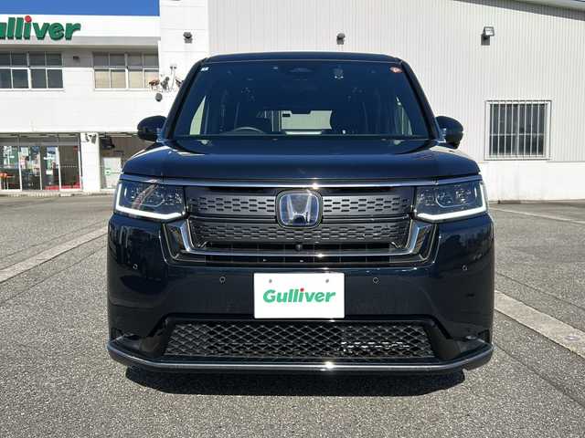 ホンダ ステップワゴン スパーダ eHEV 富山県 2022(令4)年 1.8万km ミッドナイトブルービームM ワンオーナー/スマートキー２本/衝突安全ブレーキ/メーカーオプションナビ/全周囲モニター/前後ドラレコ/シーケンシャルウィンカー/フルセグTV/Bluetooth/DVD/CD再生/ビルトインETC2.0/パドルシフト/純正16インチAW/前席シートヒーター/LEDヘッドライト/フォグランプ/ACC/ハーフレザーシート/純正フロアマット/ドアバイザー/ハンドルスイッチ/革巻きハンドル/Pバックドア/BSI/横滑り防止装置/プッシュスタート/電動パーキング/２列目オットマン/衝突軽減ブレーキ