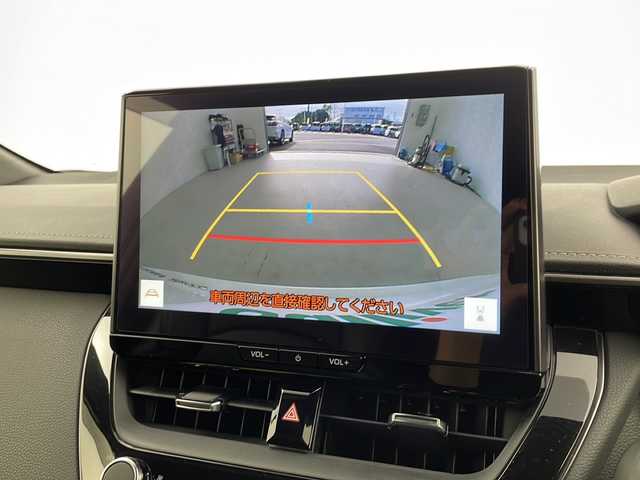 トヨタ カローラツーリング ハイブリッド ダブルバイビー 愛知県 2023(令5)年 7万km プラチナホワイトパールマイカ 禁煙車/純正10.5インチディスプレイオーディオ/(AM/FM/フルセグ)/ブラインドスポットモニター/エアロ(モデリスタ)/バックカメラ/ビルトインＥＴＣ/追従付きクルーズコントロール/純正17インチアルミホイール/ハーフレザーシート/レザーシートカバー/ウィンカー付き電動格納ミラー/ステアリングスイッチ/革巻きステアリング/プッシュスタート/スマートキー/スペアキー/純正フロアマット/純正ドアバイザー/取扱説明書/ナビ取扱説明書