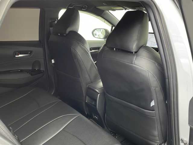 トヨタ カローラツーリング ハイブリッド ダブルバイビー 愛知県 2023(令5)年 7万km プラチナホワイトパールマイカ 禁煙車/純正10.5インチディスプレイオーディオ/(AM/FM/フルセグ)/ブラインドスポットモニター/エアロ(モデリスタ)/バックカメラ/ビルトインＥＴＣ/追従付きクルーズコントロール/純正17インチアルミホイール/ハーフレザーシート/レザーシートカバー/ウィンカー付き電動格納ミラー/ステアリングスイッチ/革巻きステアリング/プッシュスタート/スマートキー/スペアキー/純正フロアマット/純正ドアバイザー/取扱説明書/ナビ取扱説明書