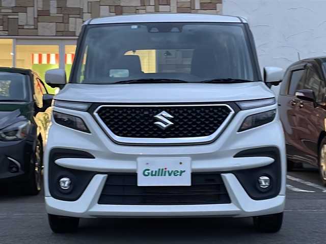 スズキ ソリオ バンディット HV MV 徳島県 2023(令5)年 5.6万km ピュアホワイトP 純正9型ナビ/全方位カメラ/VIEWスイッチ/デュアルブレーキサポートシステム/クルーズコントロール追従有/ヘッドアップディスプレイ/両側パワースライドドア/ドライブレコーダー前後/フルセグTV（走行中視聴可）/コーナーセンサー前後/純正フロアマット/USB入力端子/横滑り防止装置/レーンキープアシスト/盗難防止装置/オートライト/LEDヘッドライト/スマートキー