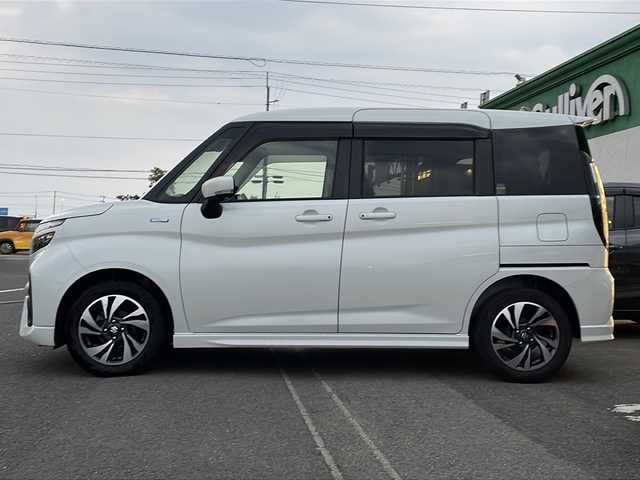 スズキ ソリオ バンディット HV MV 徳島県 2023(令5)年 5.6万km ピュアホワイトP 純正9型ナビ/全方位カメラ/VIEWスイッチ/デュアルブレーキサポートシステム/クルーズコントロール追従有/ヘッドアップディスプレイ/両側パワースライドドア/ドライブレコーダー前後/フルセグTV（走行中視聴可）/コーナーセンサー前後/純正フロアマット/USB入力端子/横滑り防止装置/レーンキープアシスト/盗難防止装置/オートライト/LEDヘッドライト/スマートキー