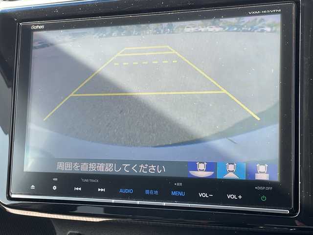 ホンダ ステップワゴン スパーダ ホンダセンシング 愛媛県 2016(平28)年 4.8万km ホワイトオーキッドパール ワンオーナー/純正9インチナビ/（フルセグ/AM/FM/Bluetooth/DVD)/ホンダセンシング/・衝突軽減ブレーキ/・誤発進抑制機能/・車線維持支援システム/・オートクルーズコントロール/両側パワースライドドア/バックカメラ/ETC/パドルシフト/オートライト/純正16インチアルミホイール/純正フロアマット/スマートキー×２