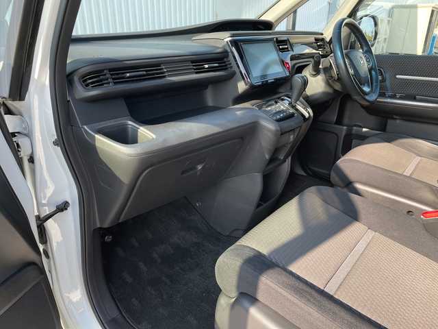 ホンダ ステップワゴン スパーダ ホンダセンシング 愛媛県 2016(平28)年 4.8万km ホワイトオーキッドパール ワンオーナー/純正9インチナビ/（フルセグ/AM/FM/Bluetooth/DVD)/ホンダセンシング/・衝突軽減ブレーキ/・誤発進抑制機能/・車線維持支援システム/・オートクルーズコントロール/両側パワースライドドア/バックカメラ/ETC/パドルシフト/オートライト/純正16インチアルミホイール/純正フロアマット/スマートキー×２