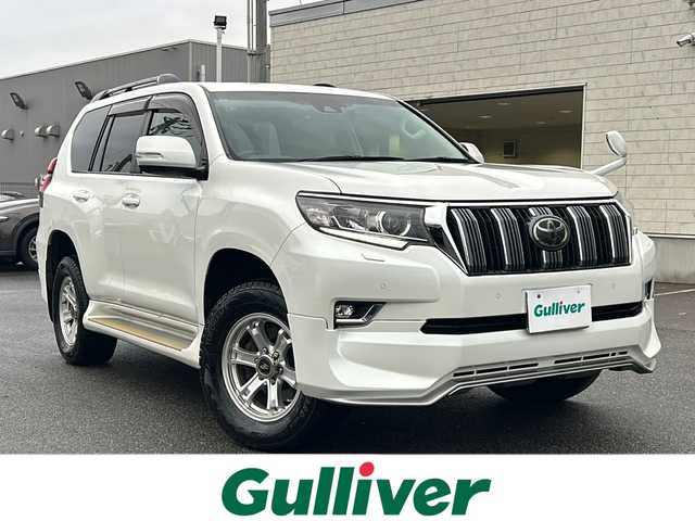 トヨタ ランドクルーザー プラド TX Lパッケージ 鳥取県 2017(平29)年 6.9万km ホワイトパールクリスタルシャイン ワンオーナー/フルタイム４WD/社外ナビ(ＫＥＮＷＯＯＤ、ＭＤＶ－Ｍ８０５Ｌ)/AM/FM、CD/DVD/Bluetooth、iPod/フルセグテレビ/純正１９インチアルミ４本積み込み/バックカメラ/クルーズコントロール/サンルーフ/ドアバイザー/プッシュスタート/ETC/ドライブレコーダー
