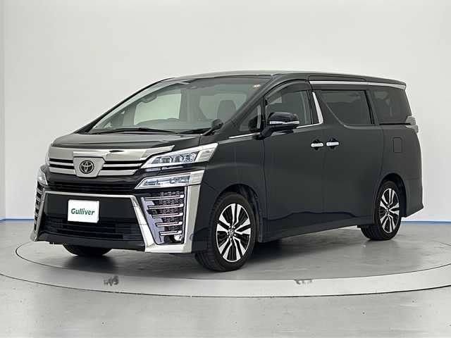 トヨタ ヴェルファイア Z Gエディション 宮城県 2021(令3)年 3.8万km バーニングブラッククリスタルシャインガラスフレーク 純正メーカーオプションナビ/（CD/DVD/BT/USB）/フルセグTV/12型純正フリップダウンモニター/前後ドライブレコーダー(Y-3100)/前席パワーシート/前席シートヒーター/前席シートエアコン/デジタルインナーミラー/レーダークルーズコントロール/両側パワースライドドア/パワーバックドア/レザーシート/三眼LEDヘッドライト/ETC/2列目オットマン/オートマチックハイビーム/BSM/TVキャンセラー/純正アルミホイール/保証書/取扱説明書