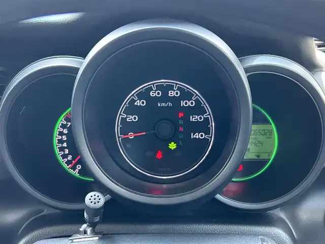 ホンダ Ｎ ＢＯＸ G Lパッケージ 島根県 2015(平27)年 6.5万km プレミアムホワイトパール 社外メモリナビ（AVIC-RZ05)/ワンセグテレビ・Bluetoothオーディオ・CD・DVD/バックカメラ/アイドリングストップ/横滑り防止装置/ウィンカーミラー/ドアバイザー/スマートキー/プッシュスタート/片側パワースライドドア/ETC/純正１４インチアルミホイール/社外フロアマット/スペアキー/スタッドレスタイヤ（積込）