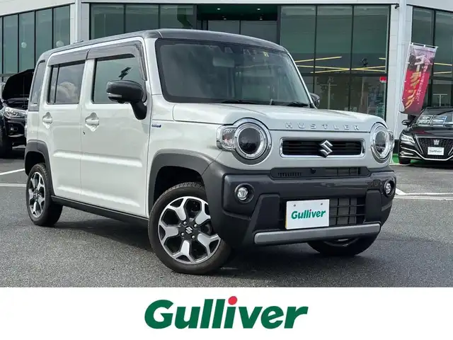 スズキ ハスラー HYBRID X 奈良県 2023(令5)年 0.6万km ピュアホワイトパール/ガンメタリック2トーン 純正9インチナビ(フルセグTV/CD/DVD/AM・FM/BT/AppleCarPlay/AndroidAuto)/アラウンドビューモニター/ビルトインETC/前後ドラレコ/シートヒーター(D/N席)/クルーズコントロール/デュアルカメラブレーキサポート/後退時ブレーキサポート/誤発進抑制機能/車線逸脱抑制機能/先行車発進お知らせ機能/ふらつき警報機能/アイドリングストップ機能/360°プレミアムUV＆IRカットガラス/ナノイーX搭載フルオートエアコン/LEDヘッドライト/純正15インチアルミホイール/純正フロアマット/スペアキー/保証書/取扱説明書