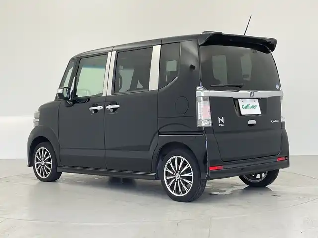 ホンダ Ｎ ＢＯＸ カスタム G ターボSSパッケージ 大阪府 2013(平25)年 4.9万km クリスタルブラックパール 社外ナビ/・フルセグテレビ/・CD/DVD/バックカメラ/両側パワースライドドア/クルーズコントロール/オートライト/スマートキー/エンジンスタートボタン/ＥＴＣ/純正１５インチアルミホイール/横滑り防止装置