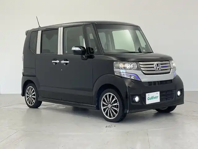 ホンダ Ｎ ＢＯＸ カスタム G ターボSSパッケージ 大阪府 2013(平25)年 4.9万km クリスタルブラックパール 社外ナビ/・フルセグテレビ/・CD/DVD/バックカメラ/両側パワースライドドア/クルーズコントロール/オートライト/スマートキー/エンジンスタートボタン/ＥＴＣ/純正１５インチアルミホイール/横滑り防止装置