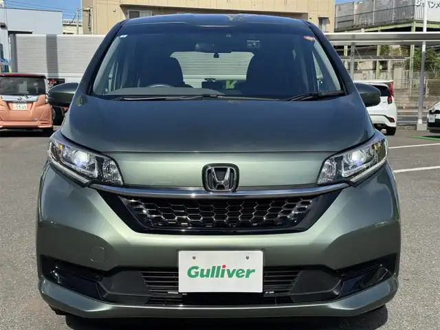 ホンダ フリード＋ G ホンダセンシング 千葉県 2021(令3)年 2.7万km シルバーミストグリーンM ワンオーナー/ホンダセンシング/・衝突被害軽減ブレーキ/・誤発進抑制機能/・車線逸脱防止支援システム/・アダプティブクルーズコントロール/コーナーセンサー/カーテンエアバッグ/LEDヘッドライト/純正9インチメモリナビ/Bluetooth/CD＆DVD再生/バックカメラ/フルセグTV/AM・FMラジオ/ETC/前後ドライブレコーダー/両側パワースライドドア/純正フロアマット/ハーフレザーシート/D＋N席シートヒーター/革巻きステアリング/純正15インチアルミホイール/ドアバイザー/プッシュスタート/スマートキー/スペアキー/取扱説明書＆保証書/R7年記録簿