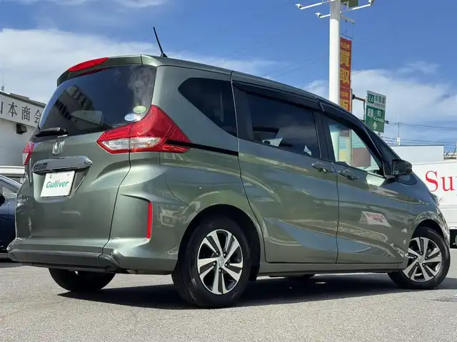 ホンダ フリード＋ G ホンダセンシング 千葉県 2021(令3)年 2.7万km シルバーミストグリーンM ワンオーナー/ホンダセンシング/・衝突被害軽減ブレーキ/・誤発進抑制機能/・車線逸脱防止支援システム/・アダプティブクルーズコントロール/コーナーセンサー/カーテンエアバッグ/LEDヘッドライト/純正9インチメモリナビ/Bluetooth/CD＆DVD再生/バックカメラ/フルセグTV/AM・FMラジオ/ETC/前後ドライブレコーダー/両側パワースライドドア/純正フロアマット/ハーフレザーシート/D＋N席シートヒーター/革巻きステアリング/純正15インチアルミホイール/ドアバイザー/プッシュスタート/スマートキー/スペアキー/取扱説明書＆保証書/R7年記録簿