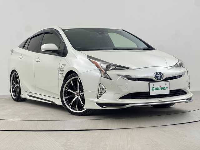 トヨタ プリウス Sセーフティプラス 熊本県 2016(平28)年 2.6万km ホワイトパールクリスタルシャイン 禁煙車/トヨタセーフティセンス/純正ナビTV/（NSCD-W66/CD/Bluetooth/ワンセグTV)/純正バックカメラ/純正ビルトインETC/純正LEDオートライト/純正LEDフォグ/純正モデリスタエアロ/純正オートアラーム/純正フロアマット/社外19インチアルミ/社外RS-R車高調/アダプティブクルーズコントロール/レーンディパーチャーアラート/ヘッドアップディスプレイ/パーキングアシスト/オートエアコン/オート電動格納ミラー/スマートキー/プッシュエンジンスタート/スペアキー/新車時保証書/取扱い説明書