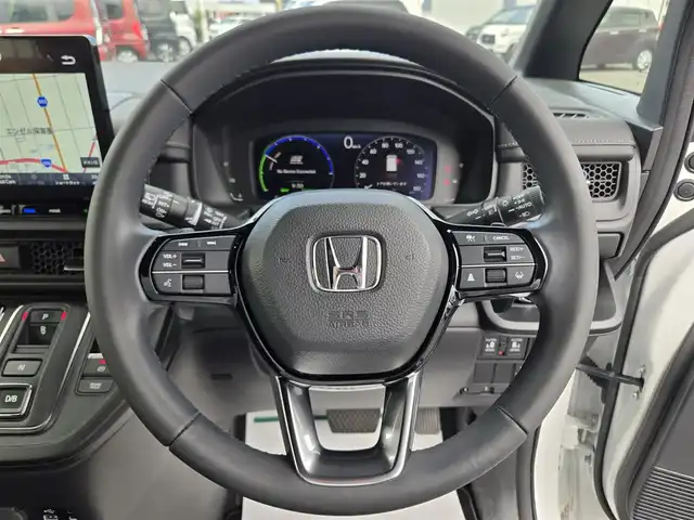 ホンダ ステップワゴン スパーダ eHEV 鹿児島県 2022(令4)年 5.1万km プラチナホワイトパール 無限ドアハンドルプロテクター/無限メタルロゴエンブレム/社外ウィンドウメッキモール/後席フリップダウンモニター　/前後純正ドライブレコーダー　/ビルトインＥＴＣ　/純正メモリーナビ（ＬＸＭ－２３７ＶＦＬｉ）　/Ｂｌｕｅｔｏｏｔｈオーディオ　/レーダークルーズコントロール　/両側パワースライドドア/D+N席シートヒーター/パドルシフト/ＭＴモード付きＡＴ/ＨＤＭＩ入力端子/パワーバックドア/マルチビューカメラシステム/ブラインドスポットインフォメーション/前後コーナーセンサー/プッシュスタート/スマートキー/エアバッグ(W+サイド)/カーテンエアバッグ