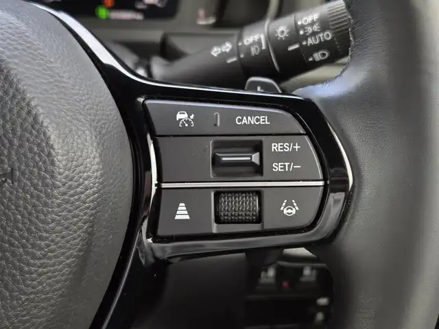 ホンダ ステップワゴン スパーダ eHEV 鹿児島県 2022(令4)年 5.1万km プラチナホワイトパール 無限ドアハンドルプロテクター/無限メタルロゴエンブレム/社外ウィンドウメッキモール/後席フリップダウンモニター　/前後純正ドライブレコーダー　/ビルトインＥＴＣ　/純正メモリーナビ（ＬＸＭ－２３７ＶＦＬｉ）　/Ｂｌｕｅｔｏｏｔｈオーディオ　/レーダークルーズコントロール　/両側パワースライドドア/D+N席シートヒーター/パドルシフト/ＭＴモード付きＡＴ/ＨＤＭＩ入力端子/パワーバックドア/マルチビューカメラシステム/ブラインドスポットインフォメーション/前後コーナーセンサー/プッシュスタート/スマートキー/エアバッグ(W+サイド)/カーテンエアバッグ