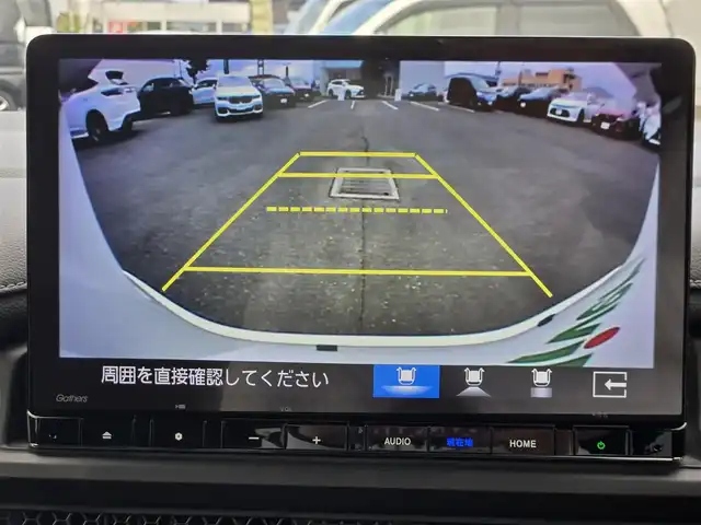 ホンダ ステップワゴン スパーダ eHEV 鹿児島県 2022(令4)年 5.1万km プラチナホワイトパール 無限ドアハンドルプロテクター/無限メタルロゴエンブレム/社外ウィンドウメッキモール/後席フリップダウンモニター　/前後純正ドライブレコーダー　/ビルトインＥＴＣ　/純正メモリーナビ（ＬＸＭ－２３７ＶＦＬｉ）　/Ｂｌｕｅｔｏｏｔｈオーディオ　/レーダークルーズコントロール　/両側パワースライドドア/D+N席シートヒーター/パドルシフト/ＭＴモード付きＡＴ/ＨＤＭＩ入力端子/パワーバックドア/マルチビューカメラシステム/ブラインドスポットインフォメーション/前後コーナーセンサー/プッシュスタート/スマートキー/エアバッグ(W+サイド)/カーテンエアバッグ