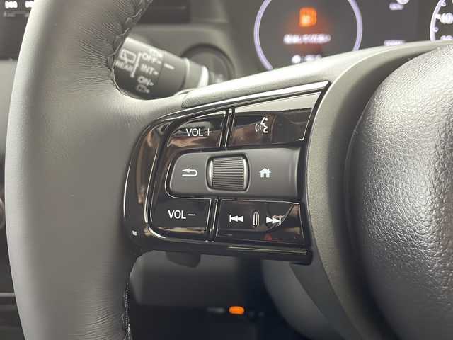 ホンダ ヴェゼル ハイブリッド e:HEV Z 愛知県 2025(令7)年 0.1千km プラチナホワイトパール /R7年10月登録済未使用車//純正HondaCONNECTナビ//フルセグTV/AMFM/Bluetooth/USB//AppleCarPlay/AndroidAuto//ビルトインETC2.0//バックカメラ//HondaSENSING//アダプティブクルーズコントロール//パーキングセンサーシステム//ブラインドスポットモニター//アダプティブドライビングビーム//後退出庫サポート//フルLEDヘッドランプ//オートライト//LEDアクティブコーナリングライト//LEDフォグランプ//フルLEDリアコンビランプ//ハンズフリーパワーテールゲート//プライムスムースコンビシート//前席シートヒーター//革巻きステアリング//ステアリングスイッチ//ステアリングヒーター//パドルシフト式減速セレクター//純正18インチアルミホイール//電子パーキングブレーキ//ブレーキホールド//ヒルディセントコントロール//プッシュスタート//電動格納ミラー//アイドリングストップ//取扱説明書