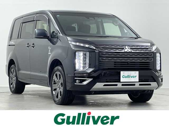 三菱 デリカＤ：５ ジャスパー 岐阜県 2023(令5)年 1.1万km グラファイトグレーメタリック/ブラックマイカ 純正10.1インチナビゲーション/AM　FM　/CD　DVD/フルセグテレビ/SD/iPod/Bluetooth/HDMI/AUX/全方位カメラ/両側パワースライドドア/革巻きステアリング/パドルシフト/ステアリングリモコン/レーダークルーズコントロール/パワーバックドア/LEDヘッドライト/オートライト/オートハイビーム/防眩ミラー/シートヒーター(D/N席)/シートカバー/パワーシート(D席)/ETC/ブラインドスポットビューモニター/衝突軽減システム/レーンデパーチャーアラート/横滑り防止装置