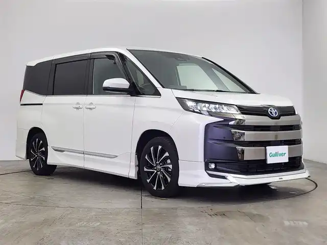 トヨタ ノア ハイブリッド S－Z 愛知県 2022(令4)年 3.9万km ホワイトパールクリスタルシャイン トヨタセーフティーセンス/トヨタチームメイト/・アドバンスパーク/10.5インチディスプレイナビ/・Bluetooth/・フルセグTV/・Applecarplay/・androidauto/14インチ有機ELフリップダウンモニター/レーダークルーズコントロール/モデリスタエアロ/両側パワースライドドア/後席サンシェード/シートヒーター/前後ドライブレコーダー/LEDライト/100V充電/USB/純正AW