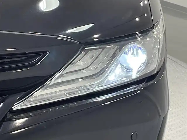 トヨタ カムリ WSレザーパッケージ 愛知県 2018(平30)年 5.8万km アティチュードブラックマイカ 純正8インチナビ/JBLサウンド/衝突軽減ブレーキ/レーダークルーズコントロール/100V電源/ビルトインETC2.0/シートヒーター/LEDヘッドライト/バックカメラ/ドライブレコーダー/ワイヤレス充電/ブラインドスポットモニター/前席パワーシート/フルセグTV/Bluetooth/コーナーセンサー/レーンキープアシスト/オートハイビーム/プッシュスタート/USB接続/スマートキー/CD/DVD再生/ミュージックサーバー/ミュージックプレイヤー接続/フロアマット/純正アルミホイール/オートライト/本革シート/ヘッドアップディスプレイ/禁煙車/パドルシフト/電動格納ミラー/フォグランプ/ステアリングリモコン/横滑り防止装置/寒冷地仕様/リヤクロストラフィックアラート/インテリジェントクリアランスソナー/電動パーキングブレーキ/オートブレーキホールド