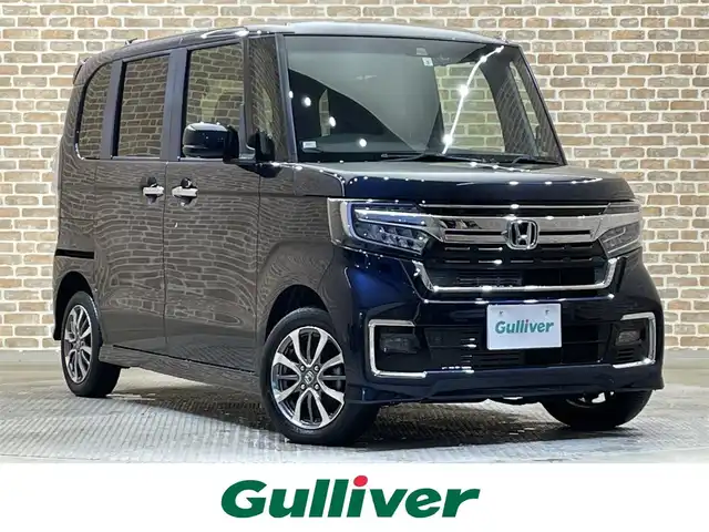 ホンダ Ｎ ＢＯＸ カスタム L 岩手県 2021(令3)年 2.6万km スカイランドブルーM ４WD/左側パワースライドドア/ホンダセンシング/衝突軽減ブレーキ/路外逸脱抑制機能/アダプティブクルーズコントロール/車線維持支援機能/ハイビームアシスト/先行車発信お知らせ機能/標識認識機能/コーナーセンサー/横滑り防止装置/アイドリングストップ/シートバックテーブル/ロールサンシェード/シートヒーター/チップアップリアシート/純正ナビ/フルセグTV/バックカメラ/ETC/ドライブレコーダー/LEDヘッドライト/LEDフォグライト/純正14インチアルミホイール