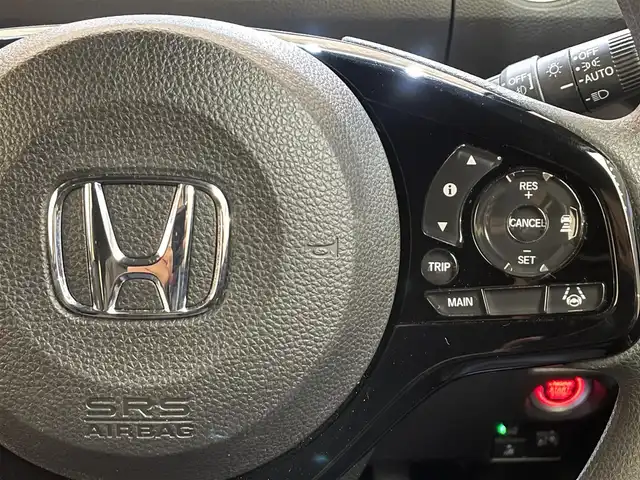 ホンダ Ｎ ＢＯＸ カスタム L 岩手県 2021(令3)年 2.6万km スカイランドブルーM ４WD/左側パワースライドドア/ホンダセンシング/衝突軽減ブレーキ/路外逸脱抑制機能/アダプティブクルーズコントロール/車線維持支援機能/ハイビームアシスト/先行車発信お知らせ機能/標識認識機能/コーナーセンサー/横滑り防止装置/アイドリングストップ/シートバックテーブル/ロールサンシェード/シートヒーター/チップアップリアシート/純正ナビ/フルセグTV/バックカメラ/ETC/ドライブレコーダー/LEDヘッドライト/LEDフォグライト/純正14インチアルミホイール