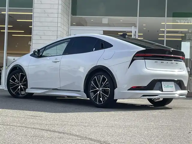 トヨタ プリウス Z 兵庫県 2023(令5)年 2.1万km プラチナホワイトパールマイカ 純正12.3インチナビ/モデリスタフルエアロ/アラウンドビューモニター/パノラマルーフ/ステアリングヒーター/レーダークルーズコントロール/革巻きステアリング/シートヒーター/エアーシート/ワイヤレス充電/トヨタチームメイト/シートメモリ/フルセグTV/純正フロアマット/純正19インチアルミホイール