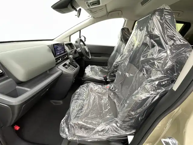 ホンダ フリード クロスター 熊本県 2025(令7)年 0.1万km未満 ベージュ 登録済未使用車　/純正9インチナビLXM-242ZFNI（ＡｐｐｌＣａｒＰｌａｙ・ＡｎｄｒｏｉｄＡｕｔｏ・ＢＴ・フルセグ・ＵＳＢ）/バックカメラ　/両側パワースライドドア　/前後クリアランスソナー　/ホンダセンシング/・急アクセル抑制機能/・アダブティブクルーズコントロール/・トラフィックジャムアシスト/・ブラインドスポットモニター/・衝突軽減ブレーキ/・先行車発進お知らせ/・路外逸脱抑制機能/・標識認識システム/・車線維持支援システム/・誤発進抑制機能/・オートハイビーム/横滑り防止/ハーフレザーシート/ルーフレール/電動パーキング/ブレーキホールド/純正１５インチAW/オートライト/LEDヘッドライト/フォグライト/スマートキー/プッシュスタート/スペアキー1本/保証書/取扱説明書