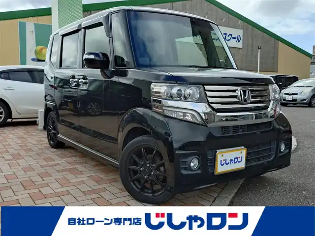 ホンダ Ｎ ＢＯＸ カスタム ターボ SSパッケージ 新潟県 2015(平27)年 7.2万km スマートブラック (株)IDOMが運営する【じしゃロン新潟店】の自社ローン専用車両になります。/こちらは現金またはオートローンご利用時の価格です。自社ローンご希望の方は別途その旨お申付け下さい/純正ナビ/FM/AM/CD/DVD視聴可能/ワンセグTV視聴可能(走行中視聴不可)/Bluetooth接続可能/バックカメラ/ETC/プッシュスタート/パドルシフト/両側パワースライドドア/シートカバー付き/前方のみドライブレコーダー(DRY-ST300)/純正フロアマット/電動格納ウィンカーミラー/横滑り防止装置/衝突被害軽減システム/スマートキー/スペアキー×１/取扱説明書