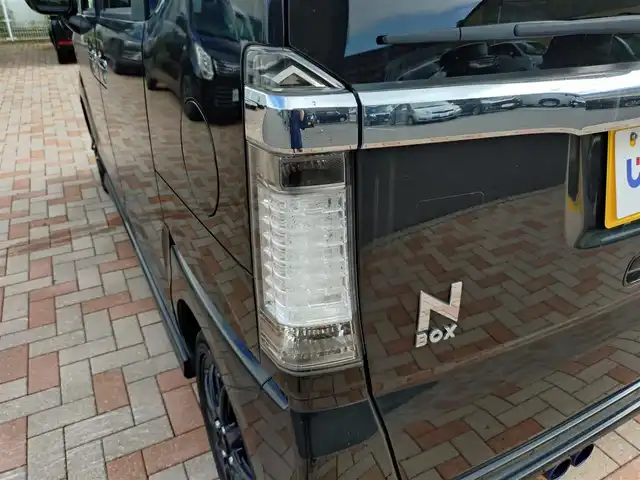 ホンダ Ｎ ＢＯＸ カスタム ターボ SSパッケージ 新潟県 2015(平27)年 7.2万km スマートブラック (株)IDOMが運営する【じしゃロン新潟店】の自社ローン専用車両になります。/こちらは現金またはオートローンご利用時の価格です。自社ローンご希望の方は別途その旨お申付け下さい/純正ナビ/FM/AM/CD/DVD視聴可能/ワンセグTV視聴可能(走行中視聴不可)/Bluetooth接続可能/バックカメラ/ETC/プッシュスタート/パドルシフト/両側パワースライドドア/シートカバー付き/前方のみドライブレコーダー(DRY-ST300)/純正フロアマット/電動格納ウィンカーミラー/横滑り防止装置/衝突被害軽減システム/スマートキー/スペアキー×１/取扱説明書