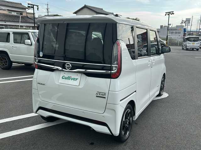 日産 ルークス ハイウェイスター X 岐阜県 2022(令4)年 2.6万km ホワイトパール 登録時走行距離25374km/社外7インチＳＤナビ　/両側電動ドア　/全方位カメラ　/コーナーセンサー後方　/ＬＥＤヘッドライト　/スマートキー　/スペアキー１本　/ドライブレコーダー前方　/純正14アルミホイール　/アイドリングストップ　/プッシュスタート　/ＥＴＣ/取扱説明書/パワーステアリング/パワーウィンドウ/エアコンAAC/Blue tooth接続/CDチェンジャー/SDミュージックサーバー/iPod/AUX接続/ベンチシート/フルフラットシート/社外フロアマット/ABS/横滑り防止装置/盗難防止装置/オートライト/エアバッグW＋サイド