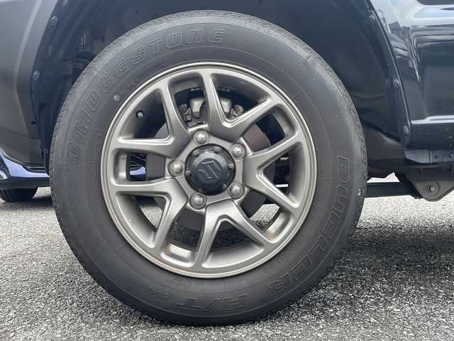 スズキ ジムニー XC 大阪府 2021(令3)年 3.7万km ミディアムグレーメタリック セーフティーサポート/・デュアルセンサーブレーキサポート/・誤発進抑制機能/・車線逸脱警報機能/・ふらつき警報機能/・先行車発進お知らせ機能/・ハイビームアシスト/ストラーダ社外ナビ/・Bluetooth/・フルセグTV/・バックカメラ/クルーズコントロール/アイドリングストップ/純正16インチアルミホイール/LEDヘッド/・オートライト/シートヒーター/プッシュスタート/ETC/新車保証書/取扱説明書