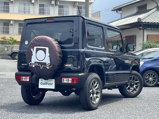 スズキ ジムニー XC 大阪府 2021(令3)年 3.7万km ミディアムグレーメタリック セーフティーサポート/・デュアルセンサーブレーキサポート/・誤発進抑制機能/・車線逸脱警報機能/・ふらつき警報機能/・先行車発進お知らせ機能/・ハイビームアシスト/ストラーダ社外ナビ/・Bluetooth/・フルセグTV/・バックカメラ/クルーズコントロール/アイドリングストップ/純正16インチアルミホイール/LEDヘッド/・オートライト/シートヒーター/プッシュスタート/ETC/新車保証書/取扱説明書