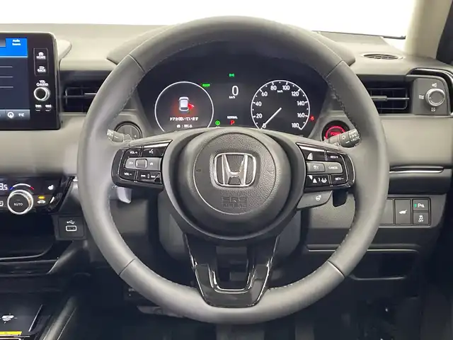 ホンダ ヴェゼル ハイブリッド e:HEV Z 栃木県 2025(令7)年 0.1千km プラチナホワイトパール 登録済未使用車/純正ナビ/(Bluetooth/フルセグTV/USB)/バックカメラ/ホンダセンシング/・衝突軽減ブレーキ/・誤発進抑制機能/・アダプティブクルーズコントロール/・車線維持支援システム/・路外逸脱抑制機能/・先行車発進お知らせ機能/・標識認識機能/・オートハイビーム/・トラフィックジャムアシスト/・アダプティブドライビングビーム/・ブラインドスポットインフォメーション/・後退出庫サポート/ビルトインETC2.0/ワイヤレス充電器/ハーフレザーシート/前席シートヒーター/パドルシフト/LEDヘッドライト/純正18インチAW/スマートキー/プッシュスタート