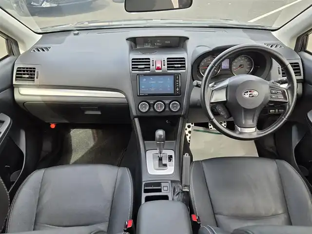 スバル インプレッサ ＸＶ 2．0i－L アイサイト 鹿児島県 2013(平25)年 5.4万km ディープチェリーパール 後付け前後コーナーセンサー　/レーダークルーズコントロール　/ビルトインＥＴＣ　/純正SDナビ（ＣＮ－３１０ＷＤ）　/Ｂｌｕｅｔｏｏｔｈオーディオ　/フルセグテレビ/Ｄ席パワーシート　/Ｄ＋Ｎ席シートヒーター/フルレザーシート/ＭＴモード付きＡＴ/パドルシフト/横滑り防止装置/プッシュスタート/スマートキー/ＨＩＤヘッドライト