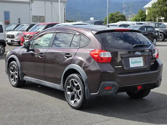 スバル インプレッサ ＸＶ 2．0i－L アイサイト 鹿児島県 2013(平25)年 5.4万km ディープチェリーパール 後付け前後コーナーセンサー　/レーダークルーズコントロール　/ビルトインＥＴＣ　/純正SDナビ（ＣＮ－３１０ＷＤ）　/Ｂｌｕｅｔｏｏｔｈオーディオ　/フルセグテレビ/Ｄ席パワーシート　/Ｄ＋Ｎ席シートヒーター/フルレザーシート/ＭＴモード付きＡＴ/パドルシフト/横滑り防止装置/プッシュスタート/スマートキー/ＨＩＤヘッドライト