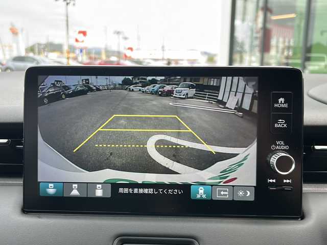 ホンダ ヴェゼル ハイブリッド e:HEV Z 岐阜県 2025(令7)年 0.1千km プラチナホワイトパール 登録時走行距離：3km/登録済み未使用車/Honda CONNECTディスプレー/バックモニター/フルセグテレビ/クルーズコントロール/ETC2.0車載器/ワイヤレス充電器/Honda SENSING/ブラインドスポットインフォメーション/アダプティブドライビングビーム(ADB)/後退出庫サポート/運転席助手席シートヒーター/ハンズフリーアクセスパワーテールゲート(予約クローズ機能付)/LEDシーケンシャルターンシグナルランプ/18インチアルミホイール/コンビシート（シートヒータ・エアシート）/ハーフレザーシート/本革巻きステアリングアイドリングストップ/保証書