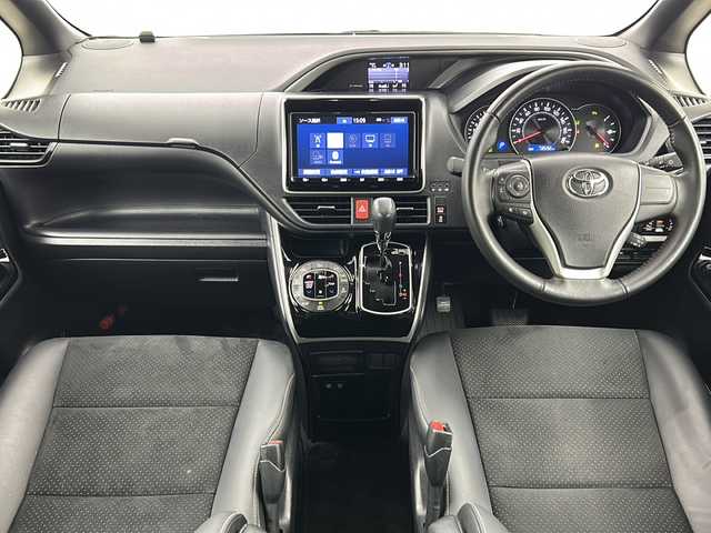 トヨタ ヴォクシー ZS 煌Ⅲ 宮城県 2020(令2)年 7.4万km ブラック 禁煙車/純正フリップダウンモニター/トヨタセーフティセンス/・プリクラッシュセーフティ/・レーンディパーチャーアラート/・オートマチックハイビーム/・先行車発進告知/クルーズコントロール/純正9インチSDナビ/・BT/CD/DVD/SD/フルセグTV/両側パワースライドドア/バックカメラ/前後ドライブレコーダー/ビルトインETC/ハーフレザーシート/革巻きステアリング/ステアリングスイッチ/プッシュスタート/スマートキー/後席ロールサンシェード/シートバックテーブル/LEDヘッドライト/LEDフォグランプ/純正16インチアルミホイール/純正ドアバイザー/社外フロアマット/横滑り防止装置/アイドリングストップ