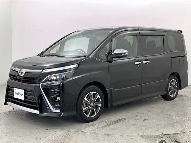 トヨタ ヴォクシー ZS 煌Ⅲ 宮城県 2020(令2)年 7.4万km ブラック 禁煙車/純正フリップダウンモニター/トヨタセーフティセンス/・プリクラッシュセーフティ/・レーンディパーチャーアラート/・オートマチックハイビーム/・先行車発進告知/クルーズコントロール/純正9インチSDナビ/・BT/CD/DVD/SD/フルセグTV/両側パワースライドドア/バックカメラ/前後ドライブレコーダー/ビルトインETC/ハーフレザーシート/革巻きステアリング/ステアリングスイッチ/プッシュスタート/スマートキー/後席ロールサンシェード/シートバックテーブル/LEDヘッドライト/LEDフォグランプ/純正16インチアルミホイール/純正ドアバイザー/社外フロアマット/横滑り防止装置/アイドリングストップ