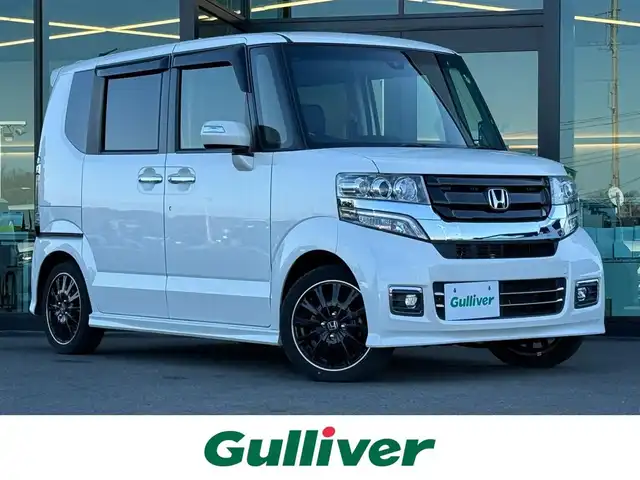 ホンダ Ｎ ＢＯＸ カスタム ターボ SSブラックSパッケージ 東京都 2016(平28)年 7万km プレミアムホワイトパールⅡ 純正ナビ/バックカメラ/ビルトインＥＴＣ/クルーズコントロール/両側電動スライドドア/ハーフレザーシート/シートヒーター/シティブレーキアクティブシステム/横滑り防止/プッシュスタート/パドルシフト/ＨＩＤヘッドライト/フォグランプ/純正フロアマット/純正１５インチＡＷ/ドアバイザー/スマートキー